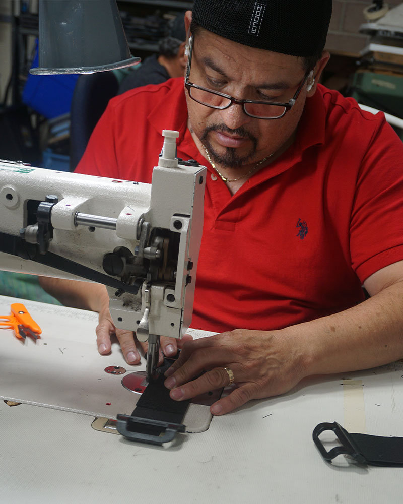 A person working on sewing machine