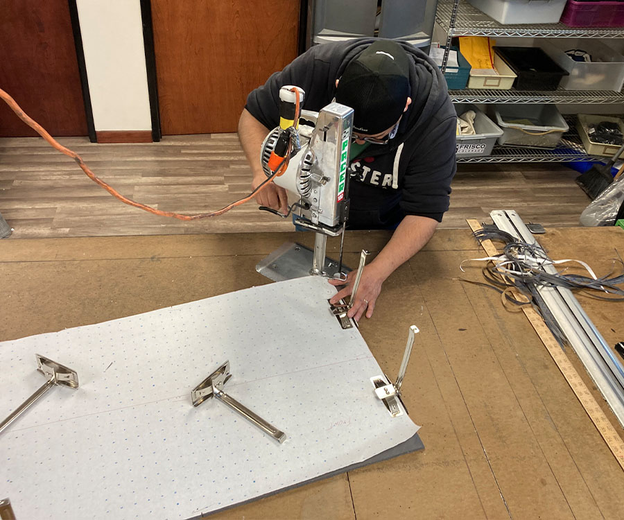 Factory and a person working on a machine