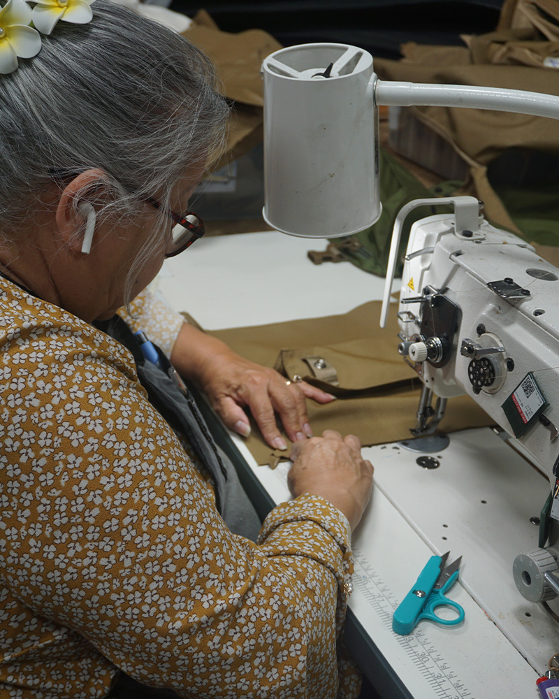A lady working on sewing machine